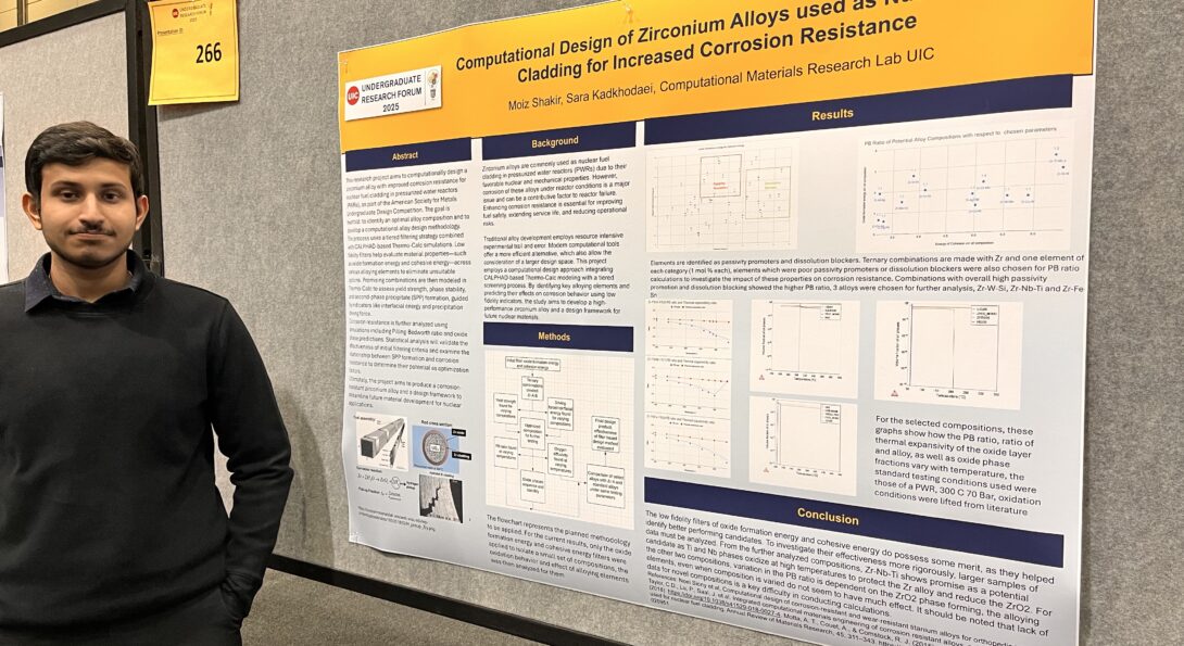 Moiz next to his poster at the 2025 Undergraduate Research Forum at UIC